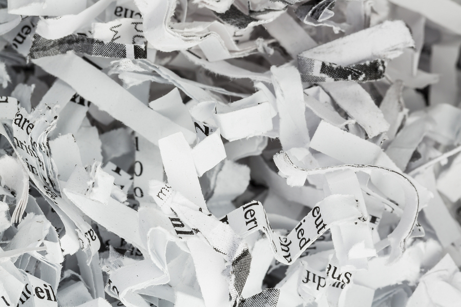 A close up of shredded paper after being properly disposed.